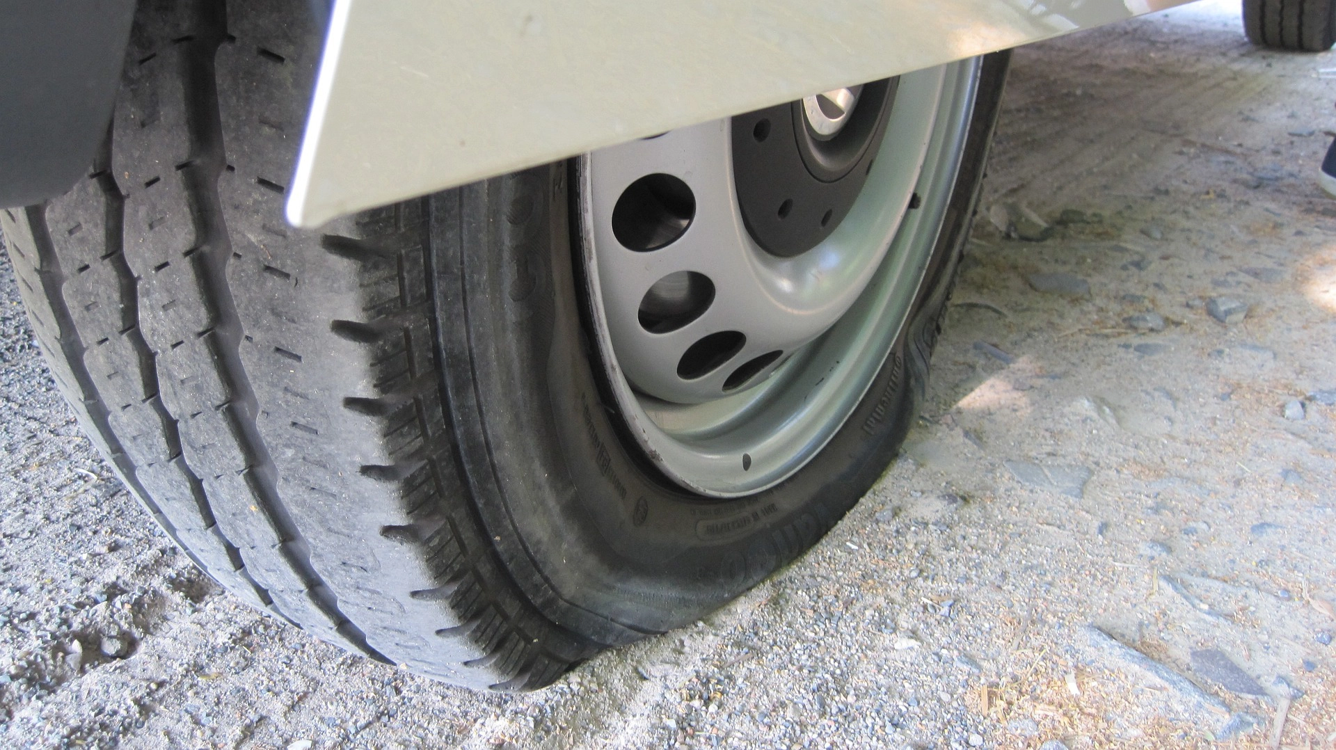 Image of a car flat tire.